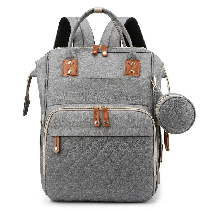 Mochila para mamá con cuna plegable