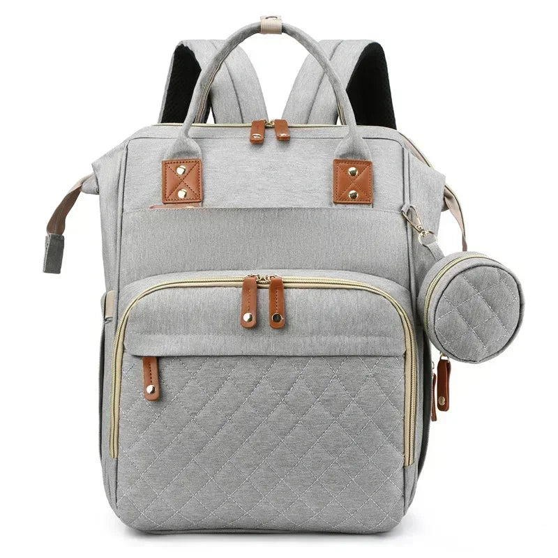 Mochila para mamá con cuna plegable
